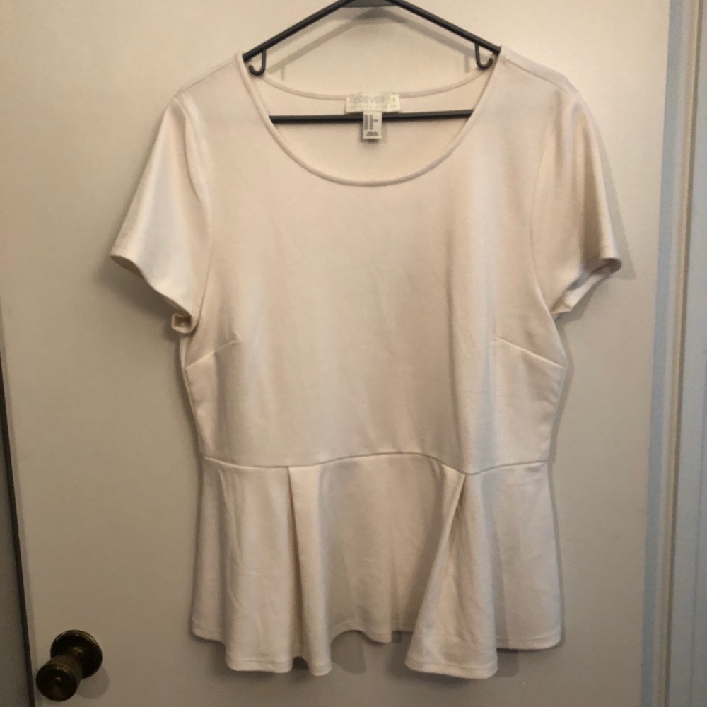 Like new, never worn, peplum top!